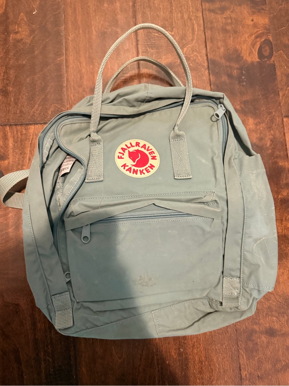 Fjallraven Kånken Everyday Backpack in Sage Green with Red Logo 16L